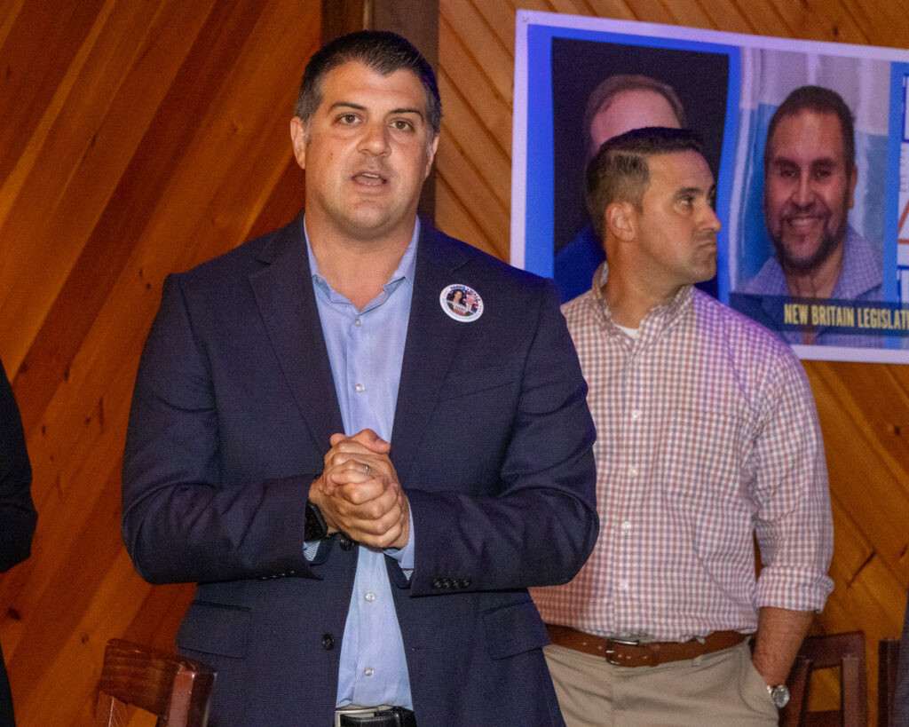 Dr Frank Gerratana photo. Rep Gary Turco (D-27) speaks while state representative candidate David DeFronzo listens.