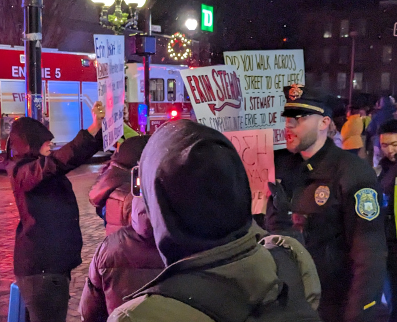 "Justice for Katherine Colon" protest. Many signs quoted in article.